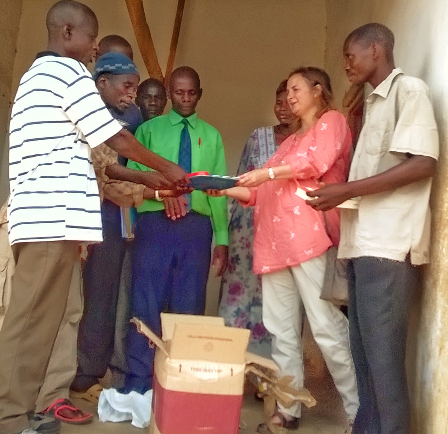 Volunteer engaging with local customs in Uganda